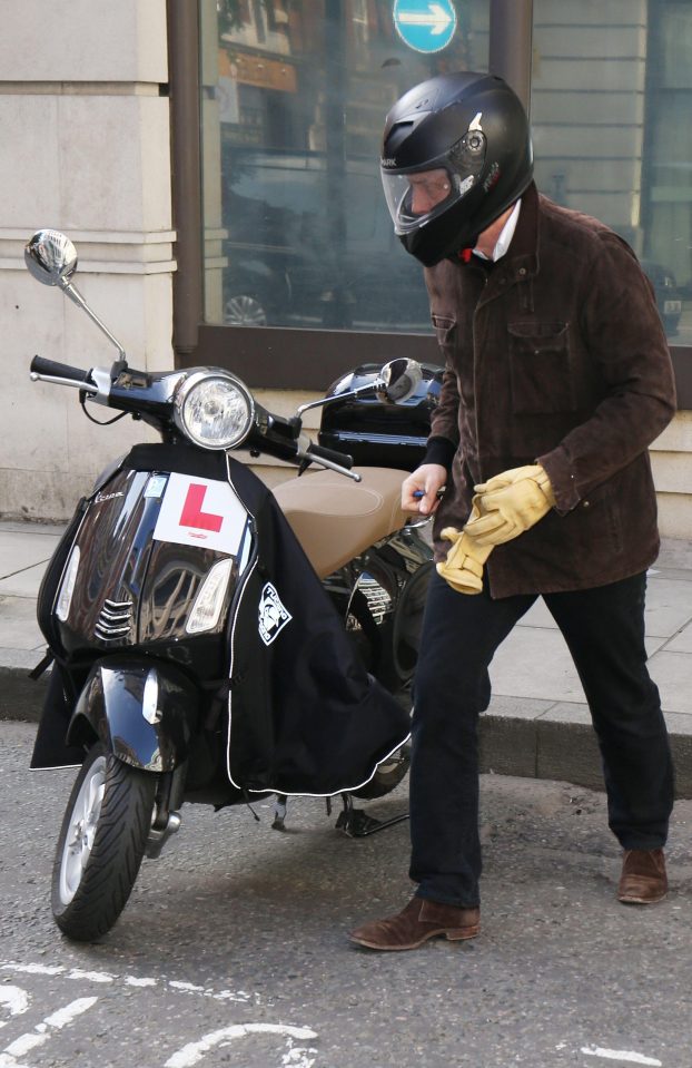  Hugh arrived at the studio on a moped