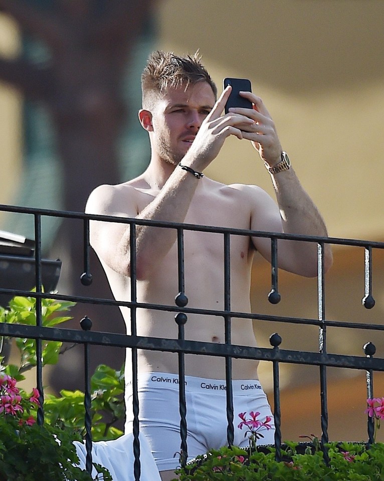 Butland appeared to be taking a photograph as he stood in his pants