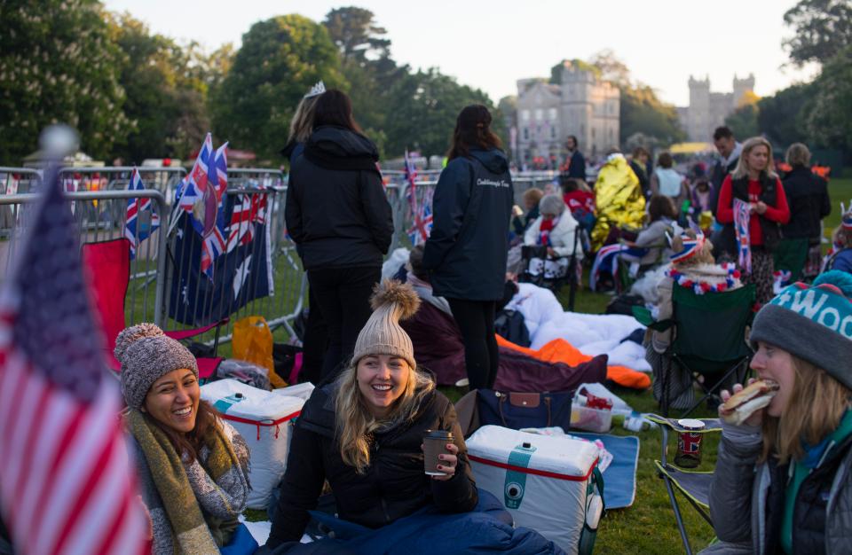 A Royal fan beams after camping out in Windsor for the wedding