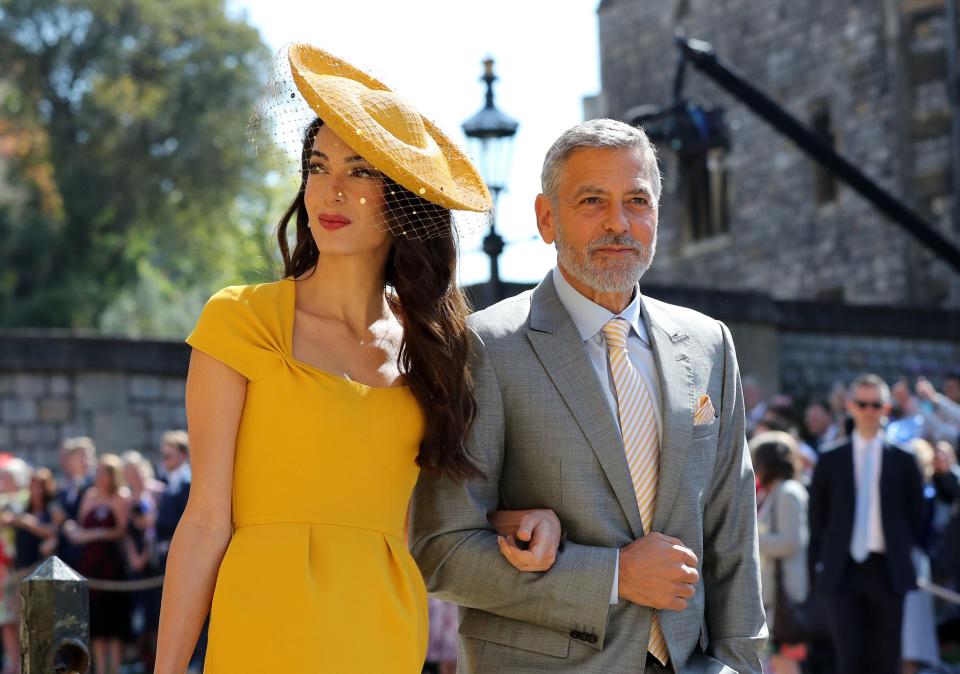  The human rights lawyer teamed her gown with a wide-brimmed matching yellow hat