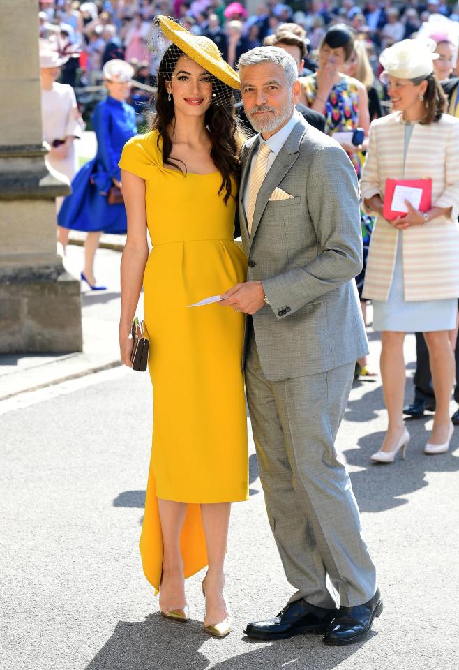  Amal Clooney looked radiant in canary yellow dress by Stella McCartney at the Royal Wedding