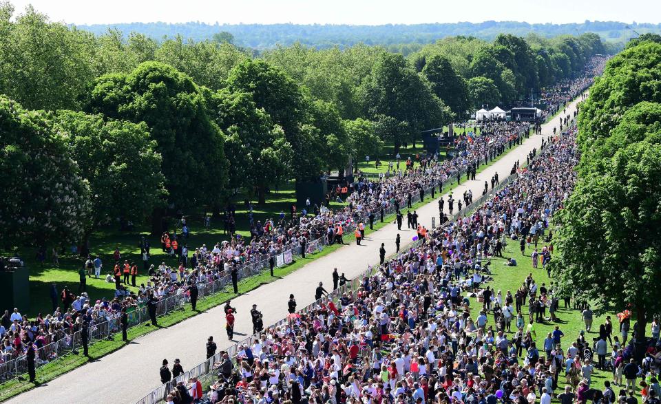  Thousands have lined the streets of Windsor to catch a glimpse of Prince Harry and Meghan