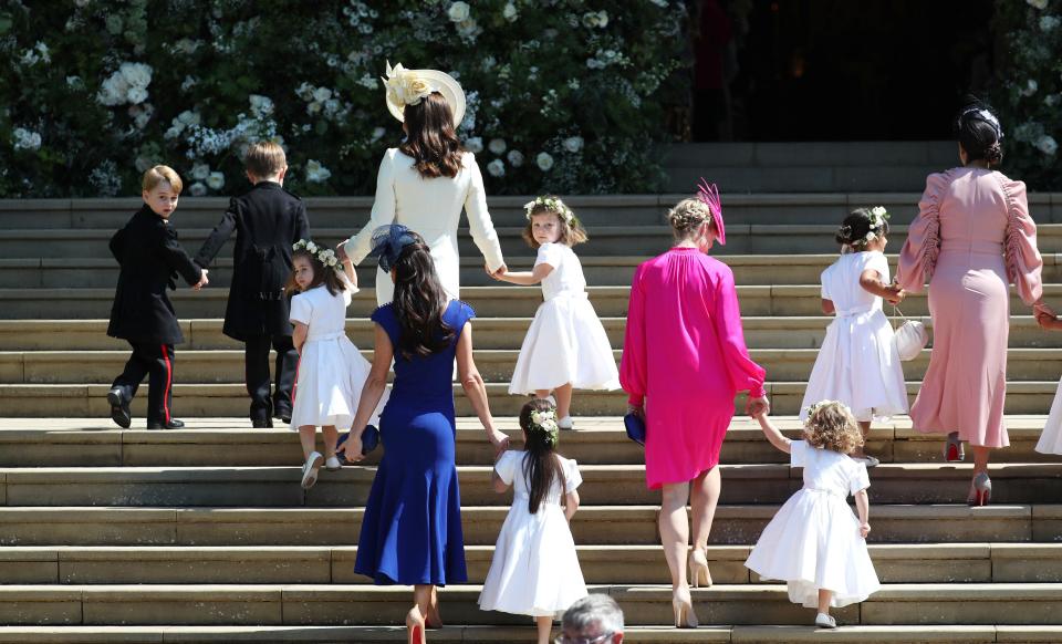  Prince George and Princess Charlotte are joined by mum Kate Middleton as they make their way into the church