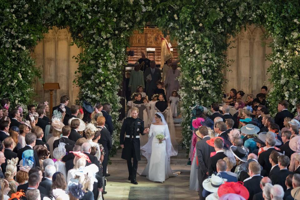  The couple earlier left St George's Chapel hand-in-hand to the delight of waiting crowds