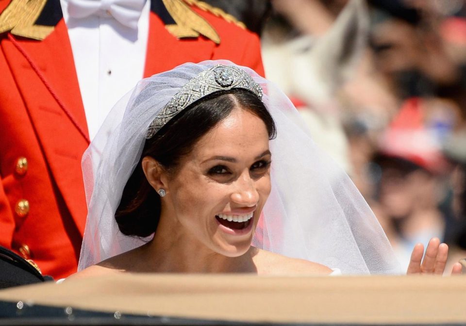 The new Duchess of Sussex smiled at crowds who had turned out in their thousands