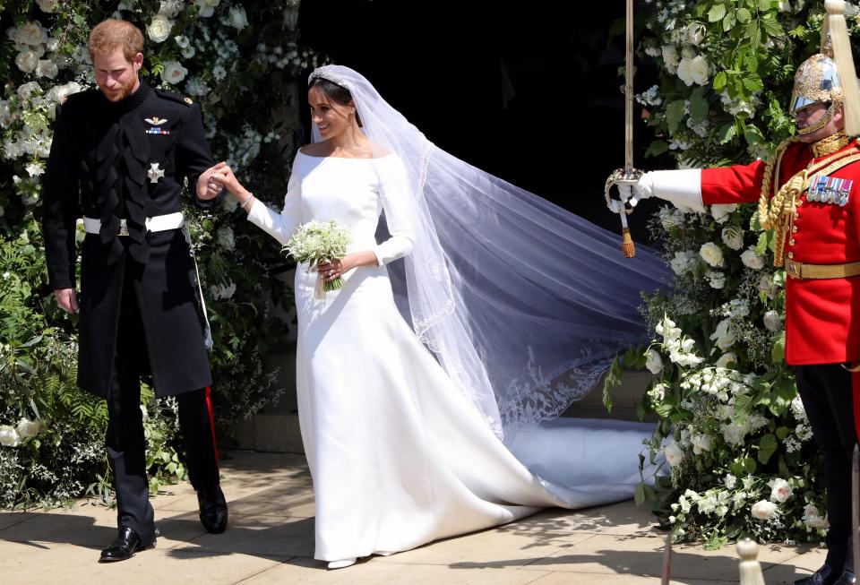  Prince Harry told Meghan Markle's dress designer that she looked 'absolutely stunning' in her custom Givenchy gown