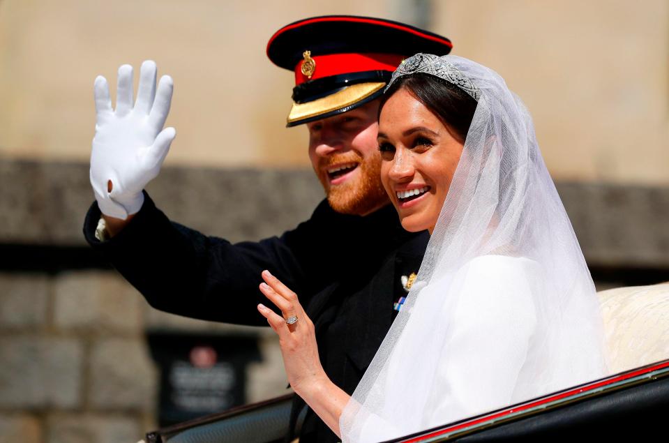  Meghan and Harry were all smiles as they waved to well-wishers in Windsor