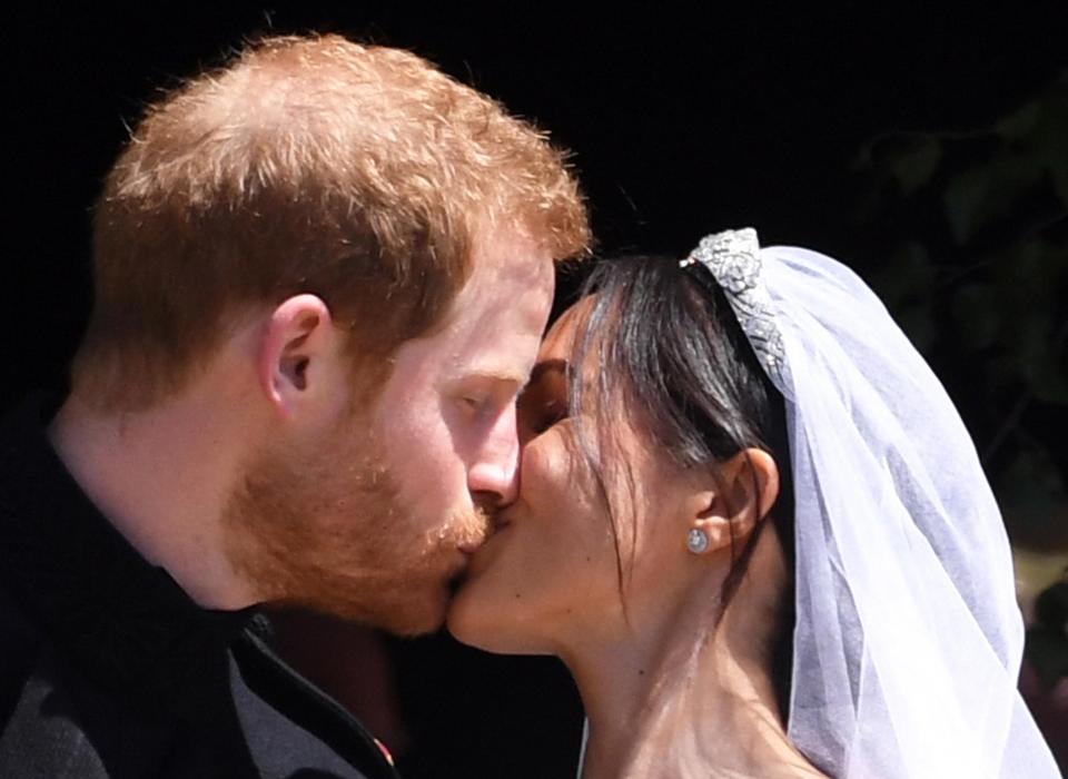  Harry and Meghan's first kiss in front of the world