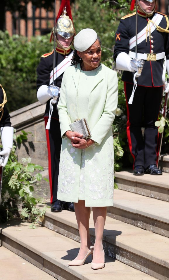  Poised, Doria awaits on the steps to send off the newlyweds