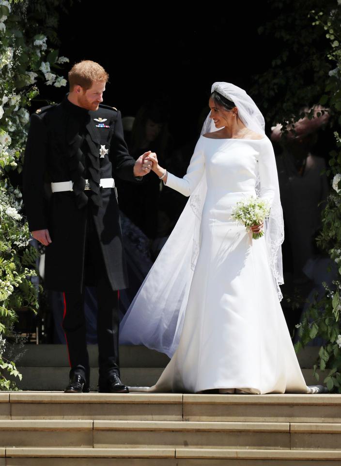  Harry and Meghan looked radiant and happy together on their big day at Windsor Castle on Saturday