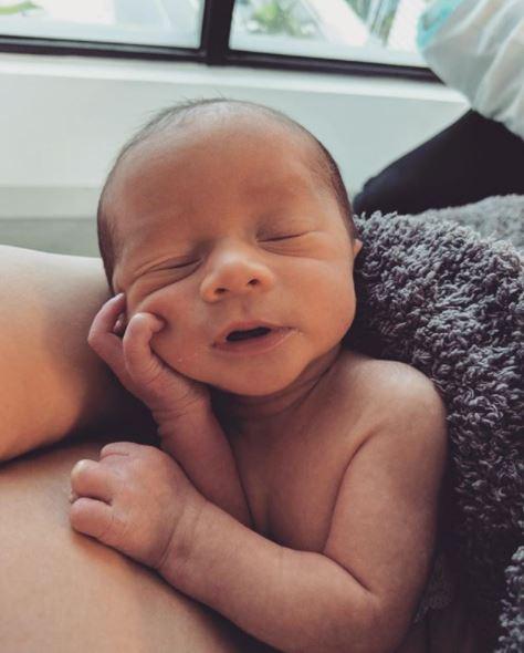  Chrissy shared the first photo of her baby on Instagram