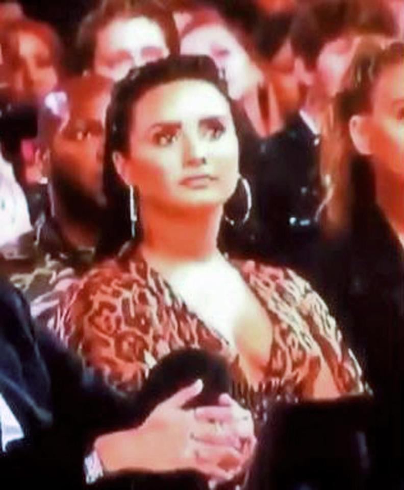  Demi was seen giving this funny glance at Taylor