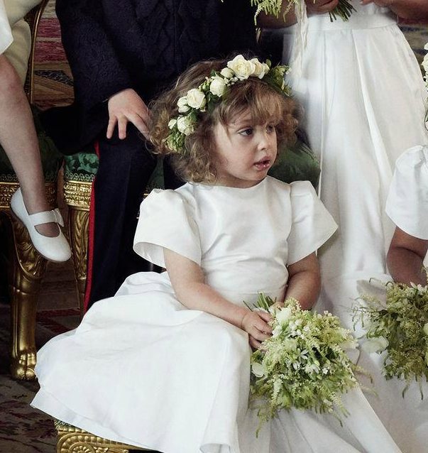 Two-year-old Zalie Warren seems to be distracted as she looks to the side for the official photograph