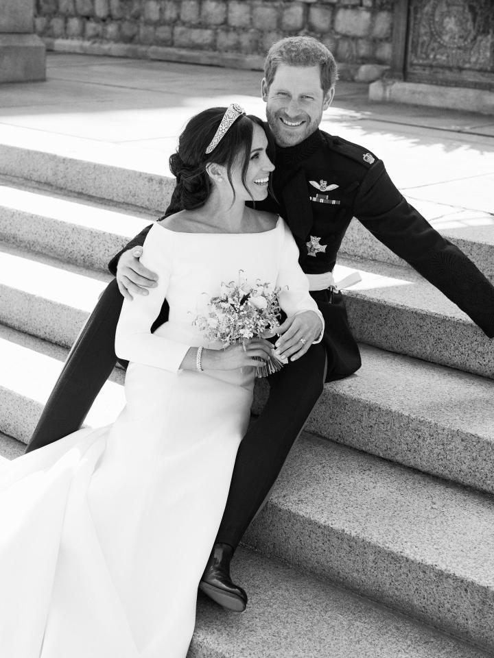 Meghan smiles next to her new husband Prince Harry