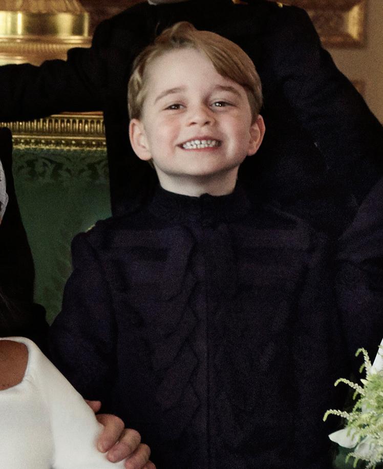 Prince George may normally be shy, but the schoolboy managed to pull out a cheeky smile for the camera