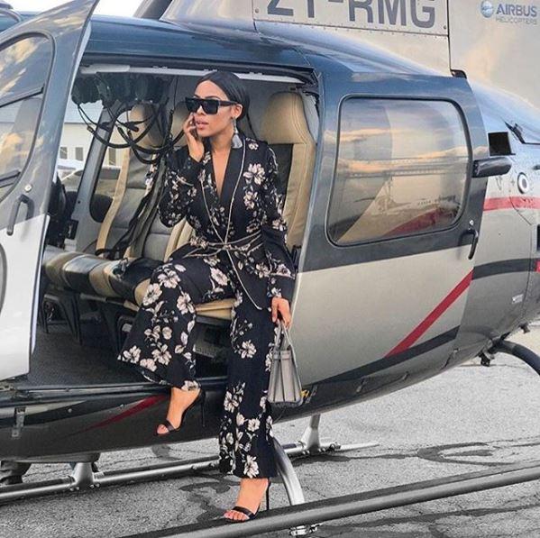 Too busy to change out of her pyjamas, too rich to care. Gorgeous South African fashion stylist Kefilwe Mabote catches yet another helicopter