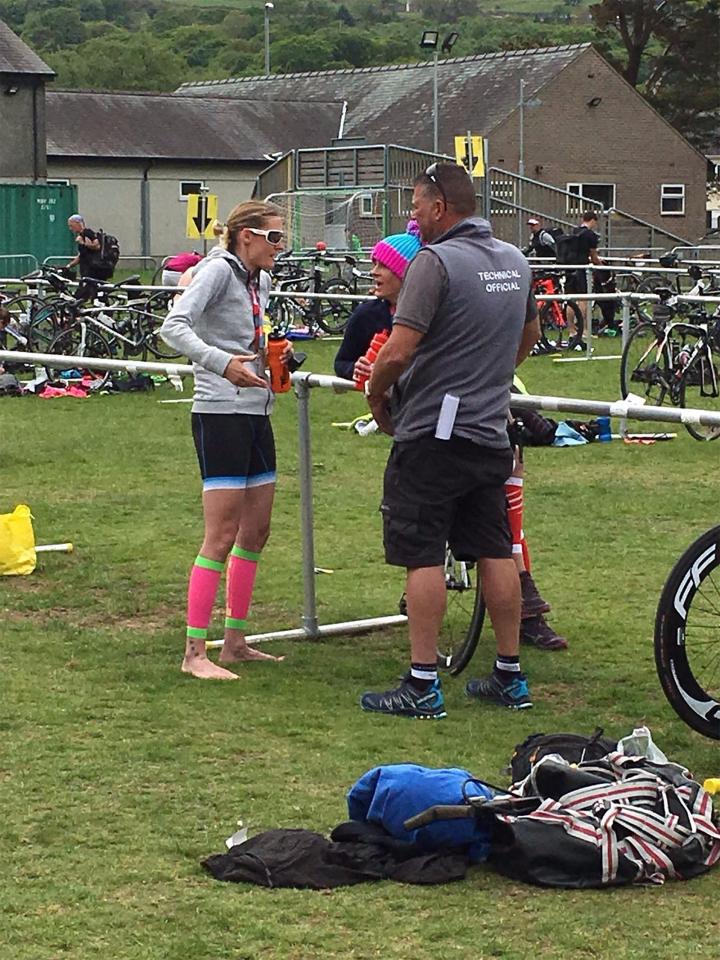  Louise, centre, is confronted by a race official, right, and another competitor, left