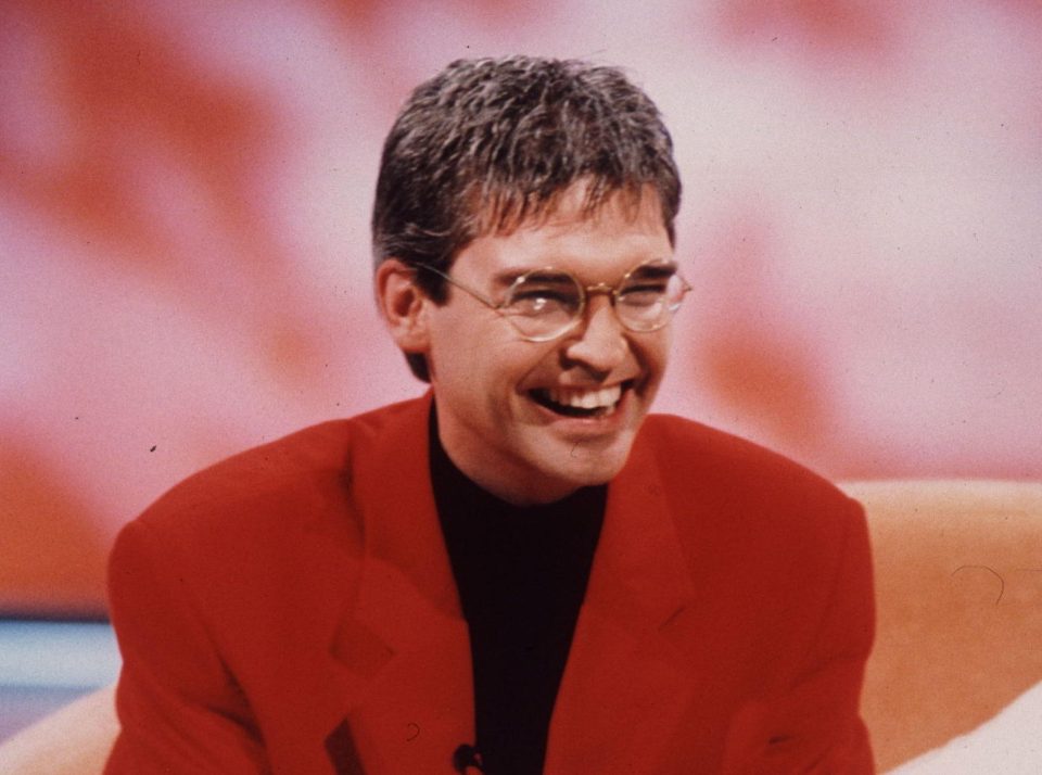  In this image, believed to be from the '90s, he has specs appeal by the bucket-load