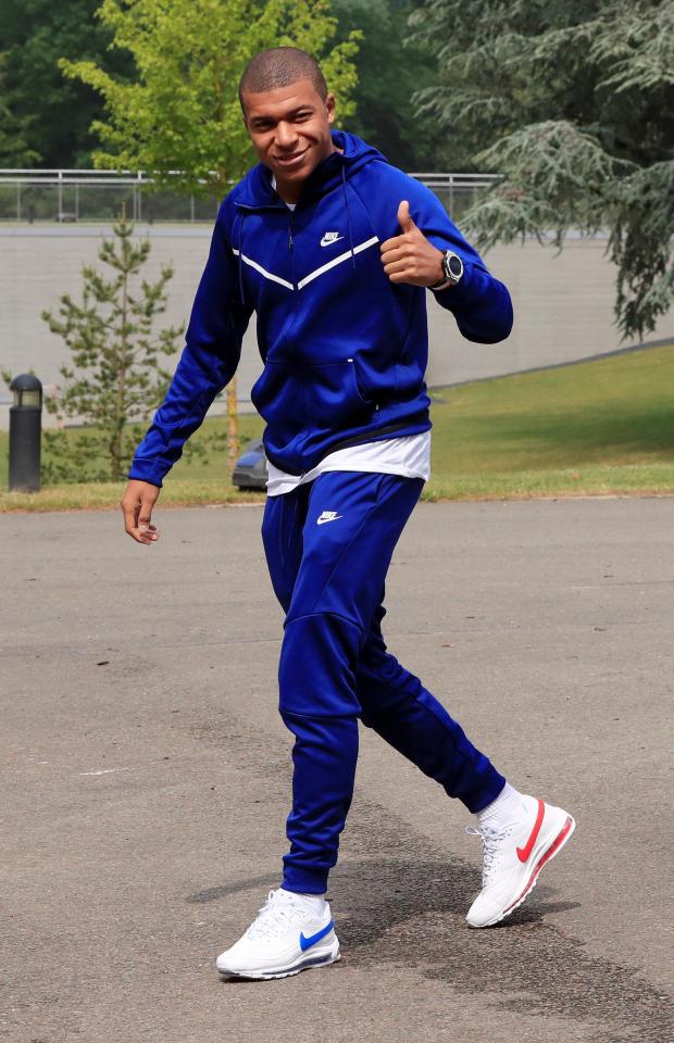  Kylian Mbappe donned an all-blue tracksuit as he linked up with the rest of the France squad