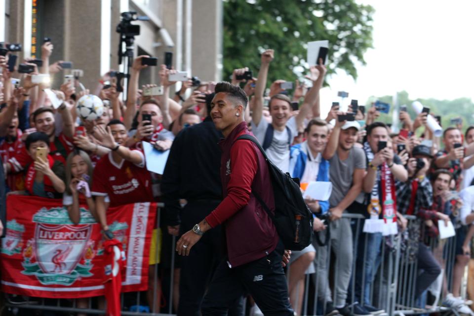  Liverpool looked in relaxed mood as they touched down at their base