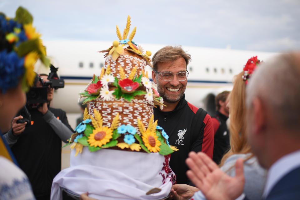  Liverpool boss Jurgen Klopp was handed a traditional Ukrainian gift on his arrival