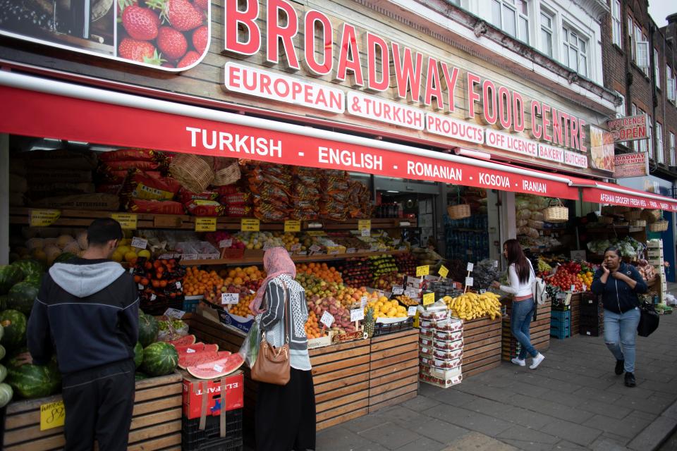  World food shops are spilling out onto the streets, selling traditional foods to the large Romanian community