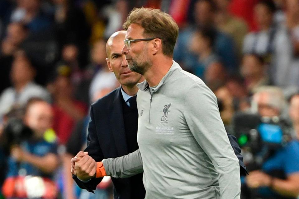 Jurgen Klopp congratulates Zinedine Zidane on his side's victory in the Champions League final