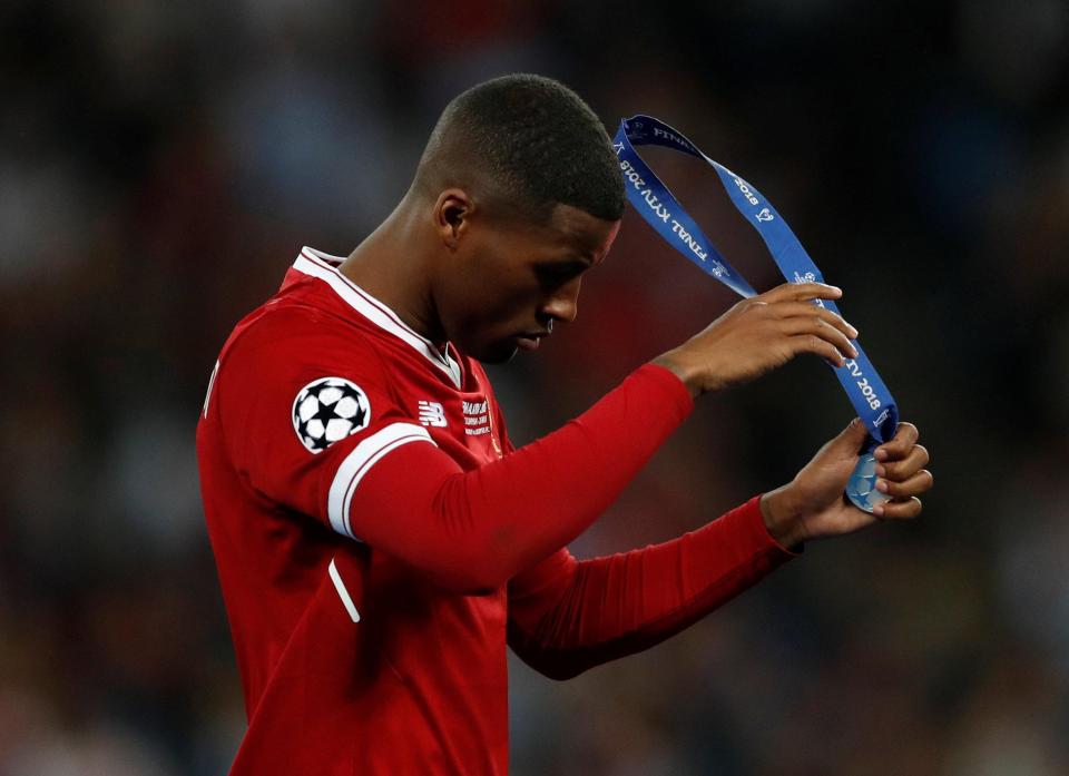 Giorginio Wijnaldum took his runners-up medal straight off in Kiev after Liverpool lost the final