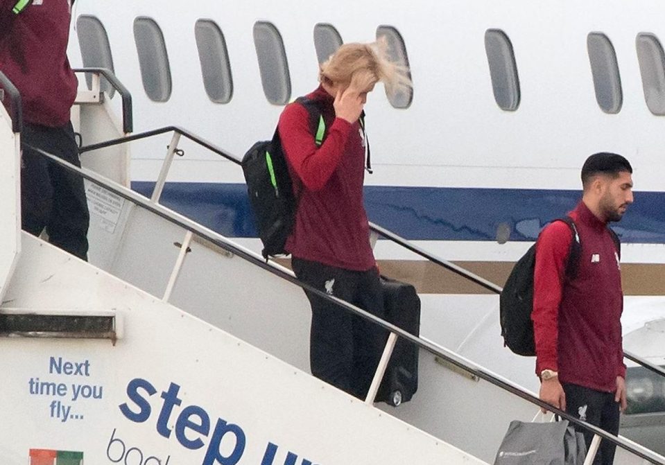 Karius looked awkward as the Reds players stepped off the plane on Merseyside