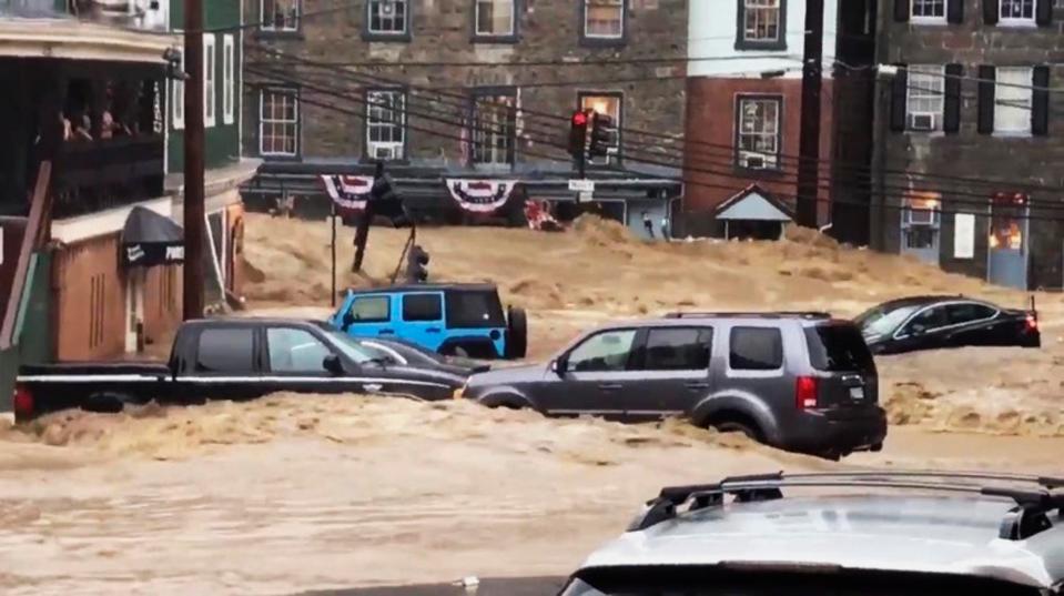  Cars are seen trapped by floodwaters in Ellicott