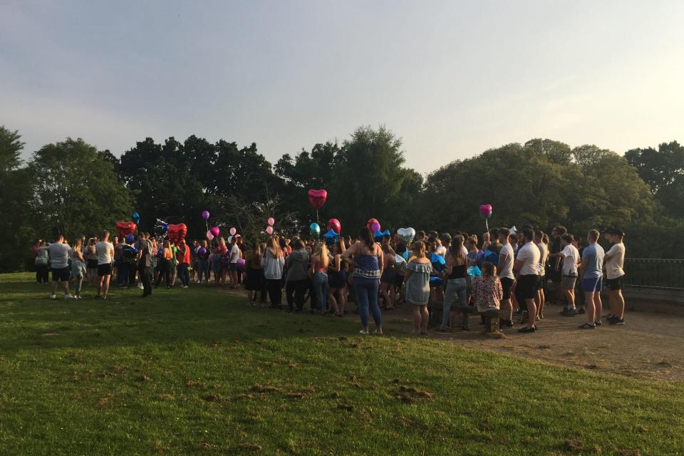 Friends and relatives gather in Havant, Hampshire, on Monday to release balloons in the memory of Tommy Cowan and Georgia Jones