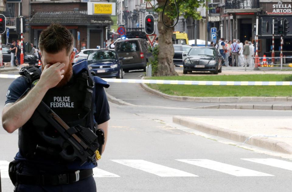  A police officer at the scene of the shooting