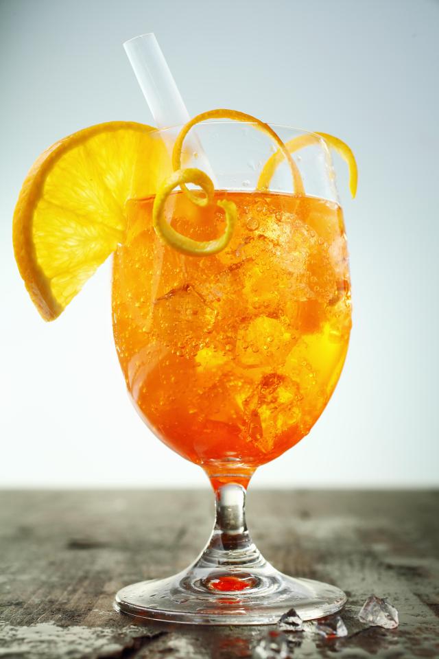  Garnish this bright drink with an orange slice