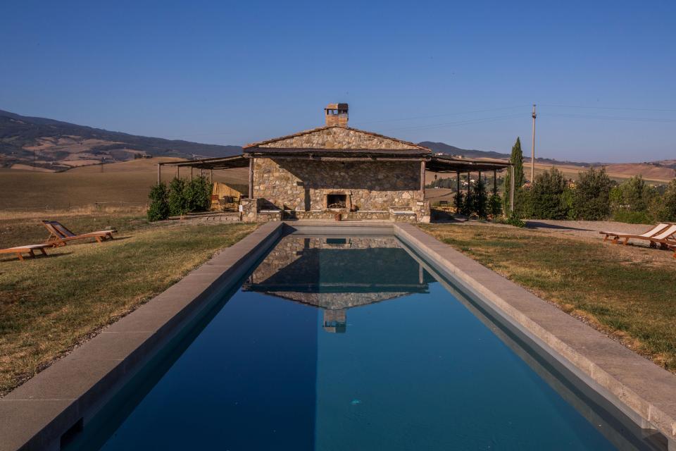 The manor house is set in the heart of Val d’Orcia, a region in Tuscany known for its hilly countryside