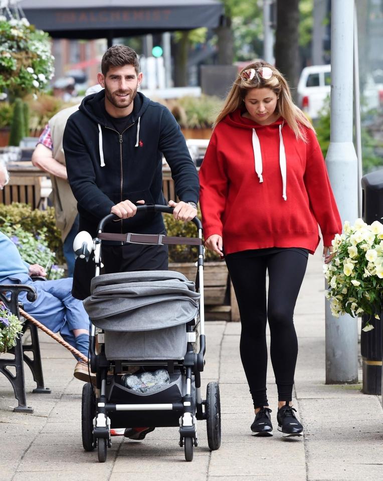  Massey, daughter of millionaire Karl, looked relaxed and comfortable in an oversized hoodie as her man pushed the pram