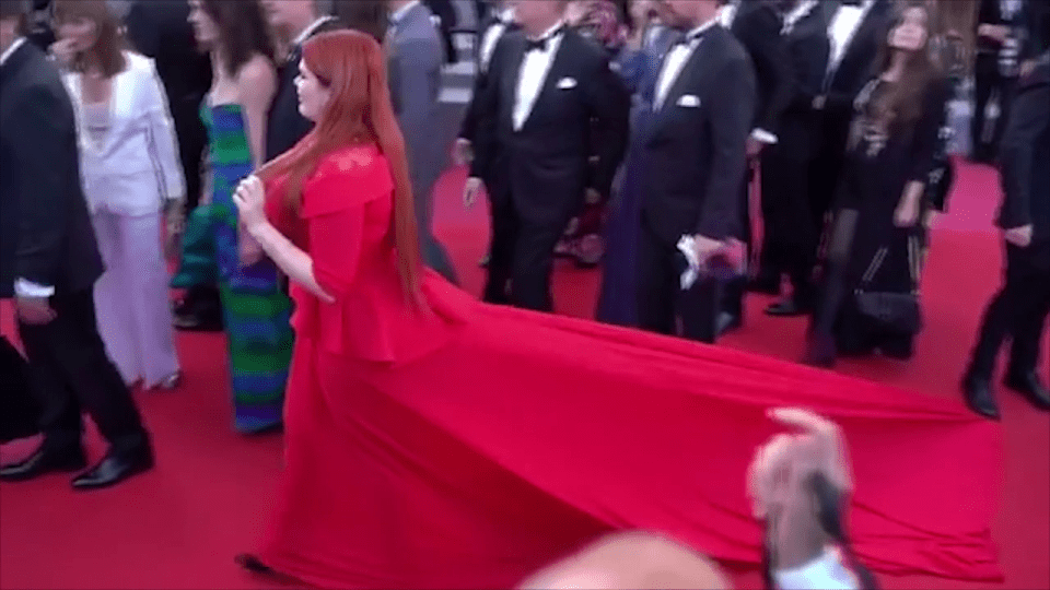  Russian model Yulia Rybakova was walking up a red carpet at the Cannes Film Festival when someone appeared to stand on her dress