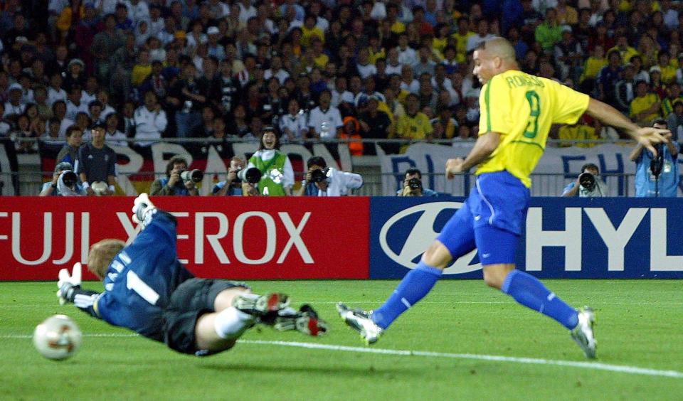 Ronaldo fires past Oliver Khan in the 2002 World Cup final