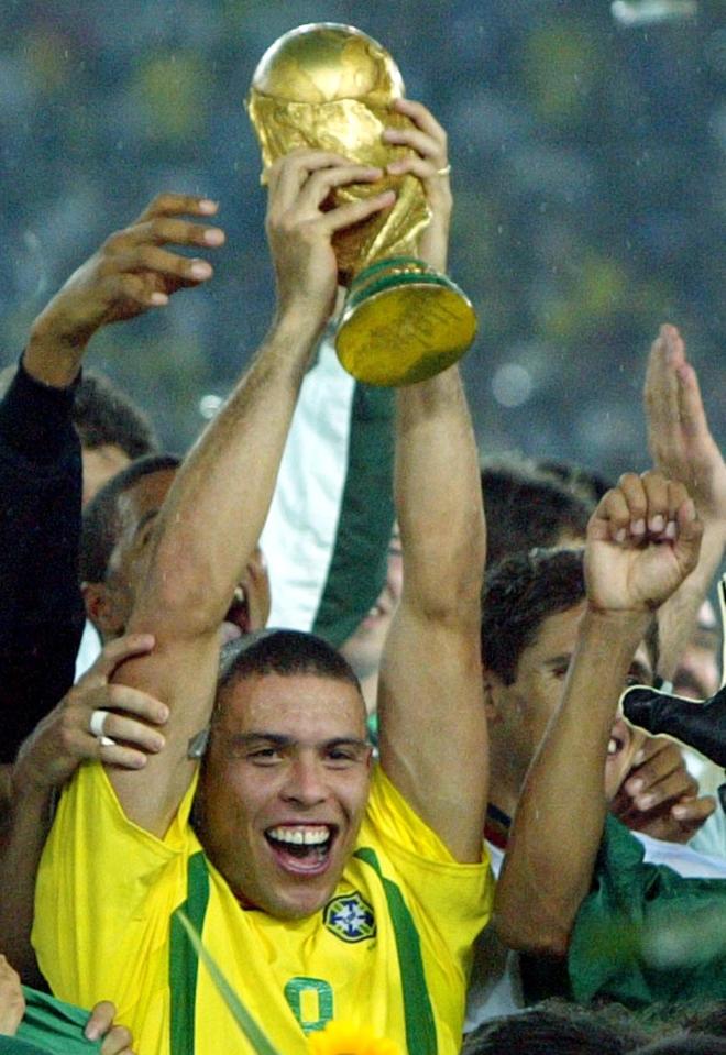  Ronaldo gets his hands on the World Cup trophy in 2002