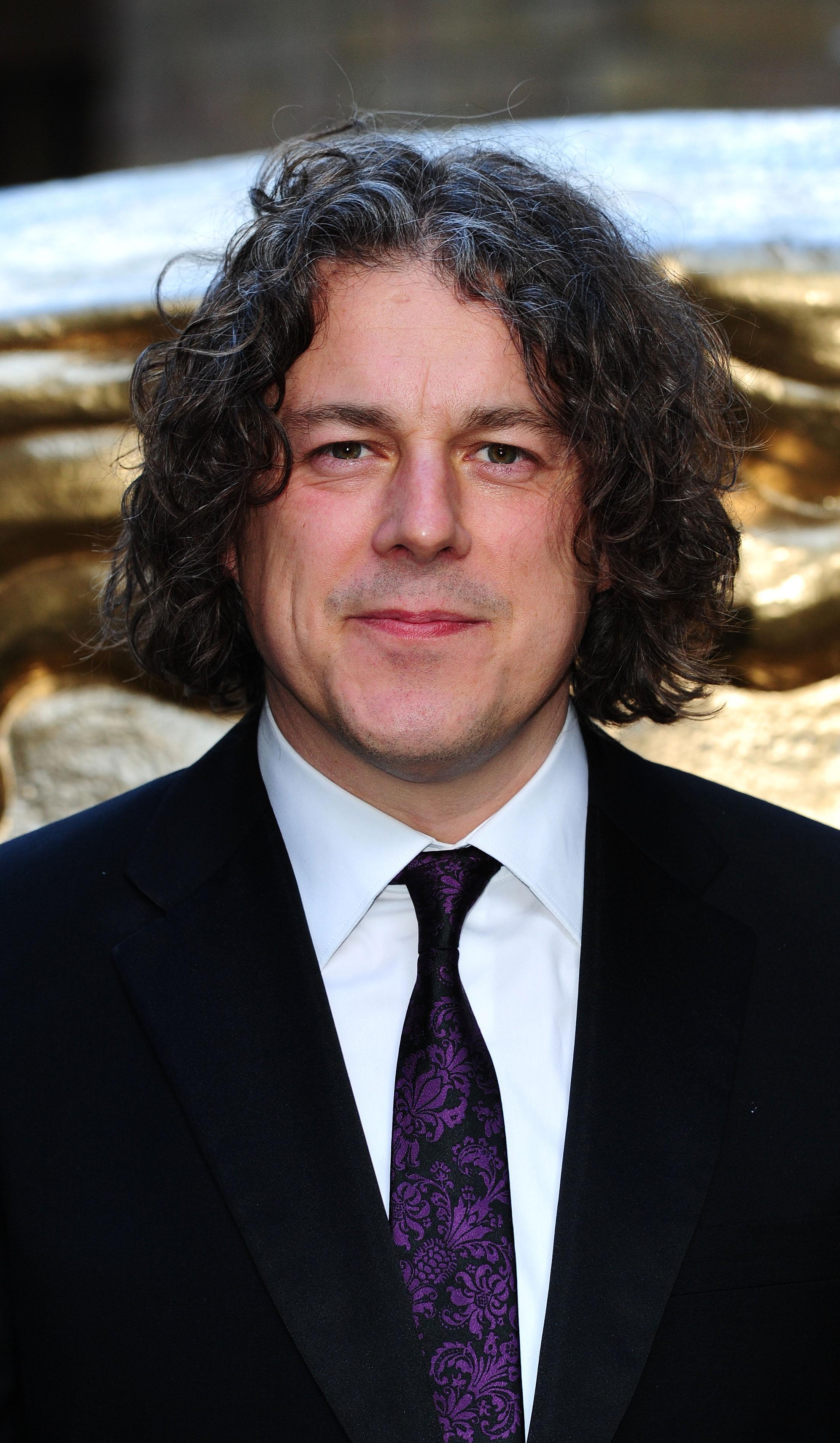 Alan Davies is a permanent panellist on QI