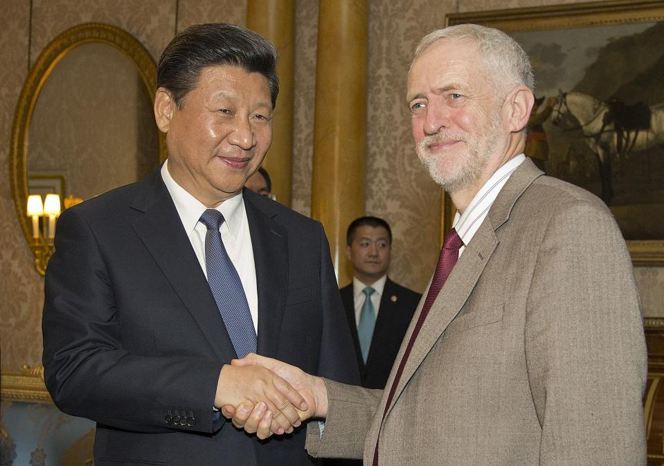  President Xi Jinping meets Jeremy Corbyn in Buckingham Palace during the 2015 state visit… but the Labour leader is opposed to Trump visiting