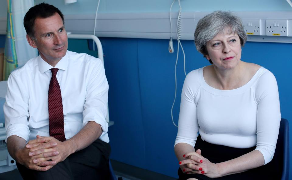  Theresa May will pump £20bn into the NHS after overruling Chancellor Philip Hammond