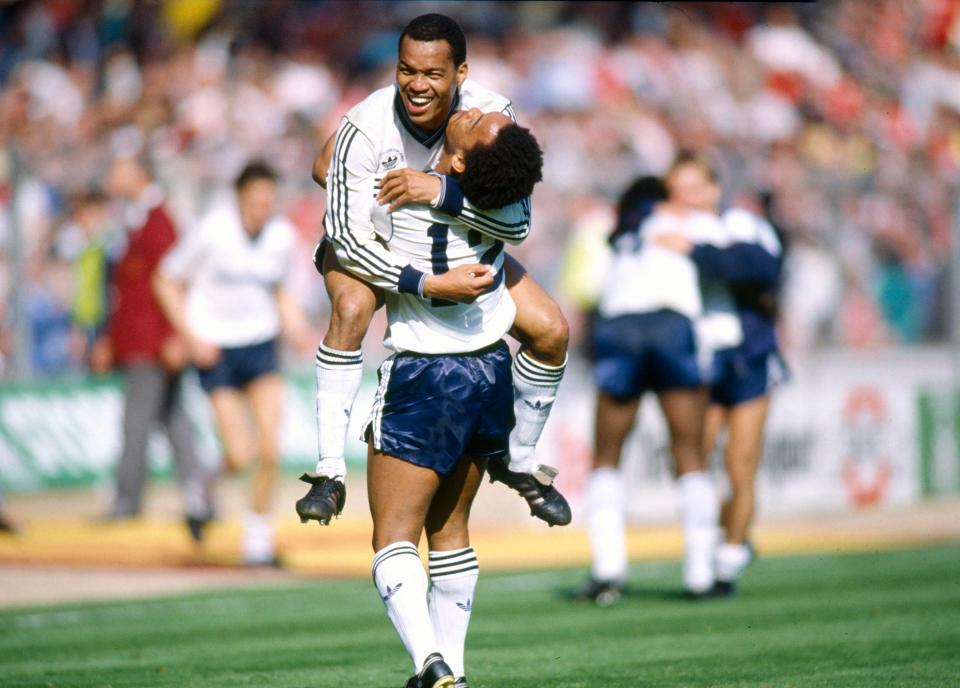  Mark Stein hugs brother Brian during Luton's memorable 3-2 win over Arsenal at Wembley in 1988