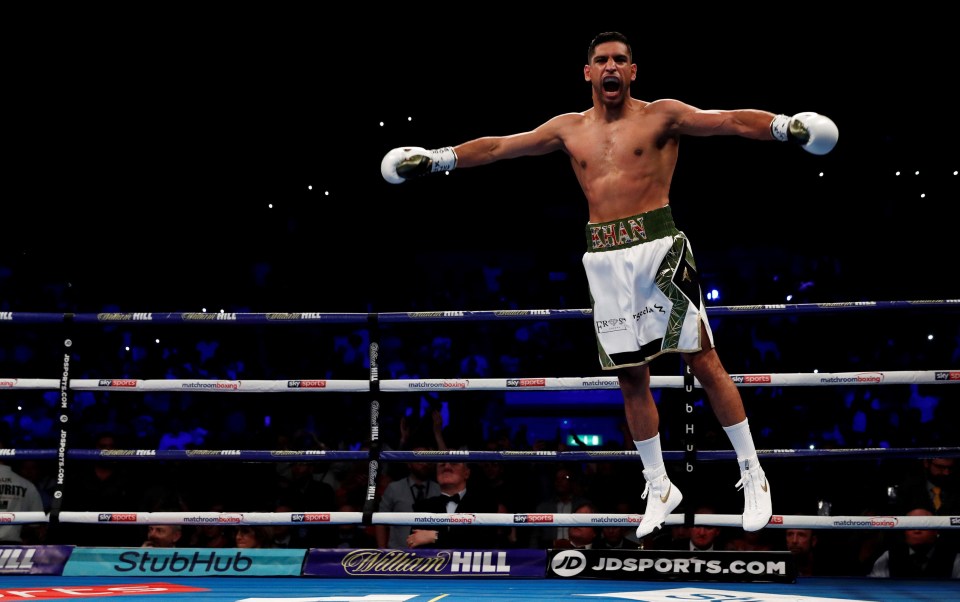 Amir Khan celebrates his comeback win over Phil Lo Greco