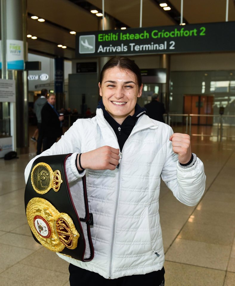  World Lightweight World Champion Katie Taylor with her Unified WBA and IBF belt at Dublin Airport