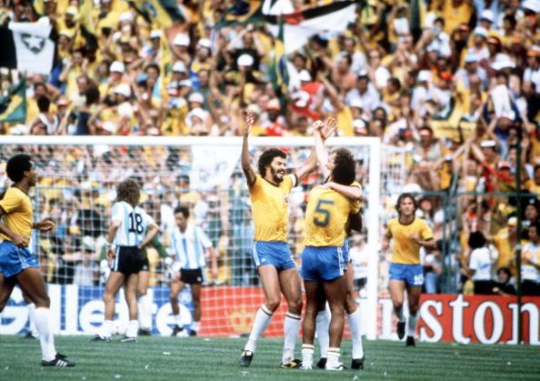 Socrates joins Falcao and Cerezo to celebrate their third goal by Junior