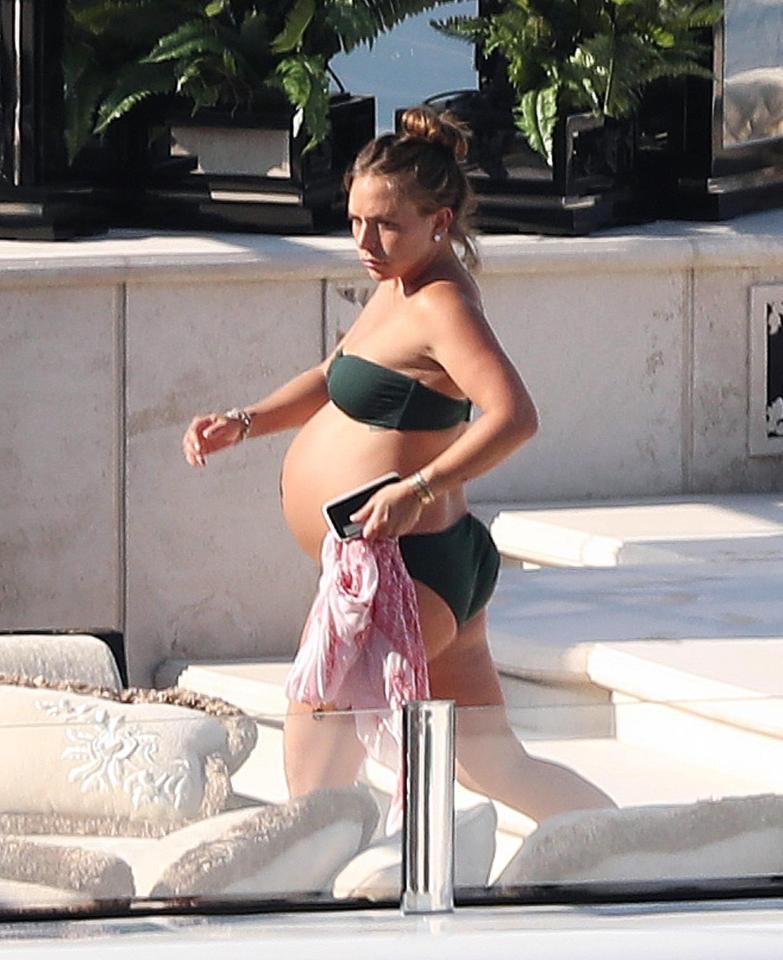  Chloe was recently spotted showing off her baby bump on her dad's yacht