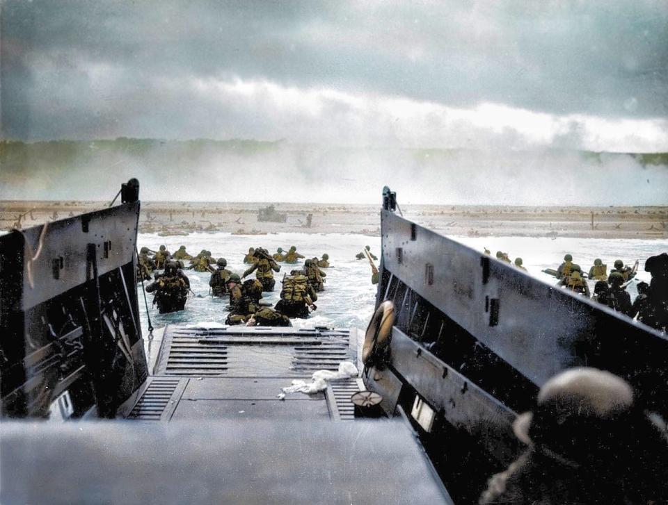  A craft from the USS Samuel Chase lands troops of the US Army First Division on Omaha Beach