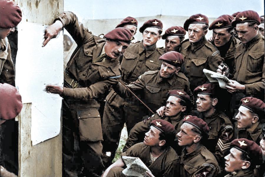  Members of the 22nd Independent Parachute Company, 6th Airborne Division attend a briefing ahead of the D-Day invasion