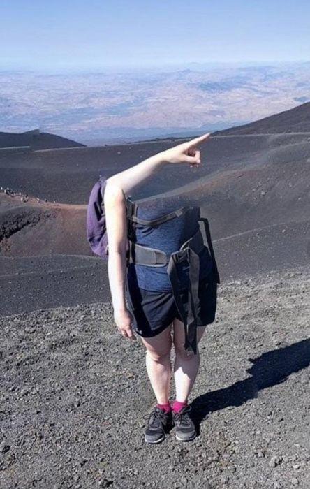  This climber may have lost her head for heights but at least she hasn't lost her sense of direction