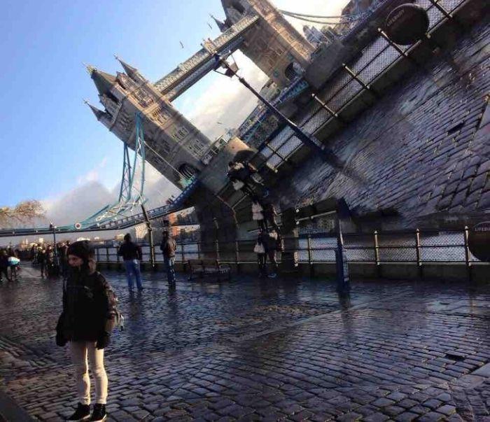  In this mind-bending picture Tower Bridge is falling down, falling down, falling down